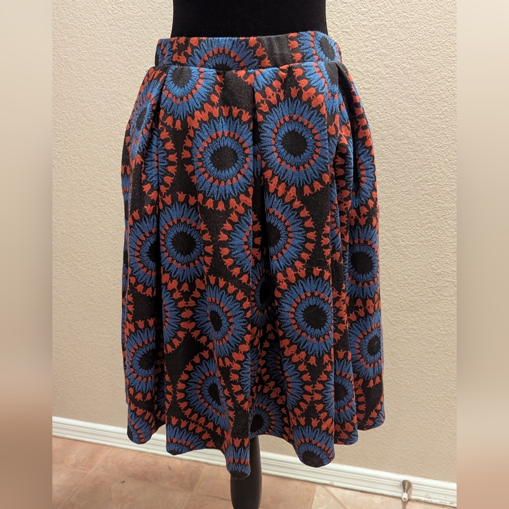 Stylish Blue and Rust Colored Patterned Skirt with Pockets